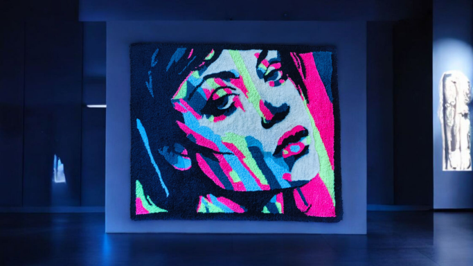 A vibrant, abstract portrait of a woman with striking colours and expressive features.