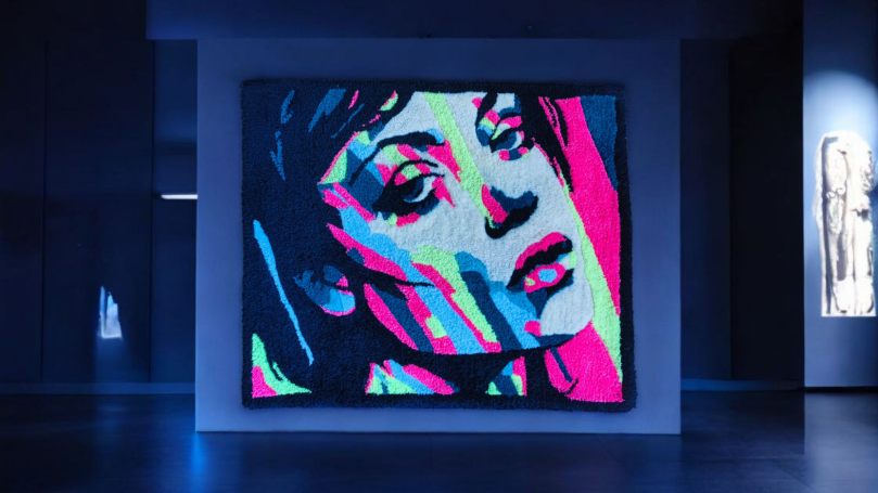 A vibrant, abstract portrait of a woman with striking colours and expressive features.